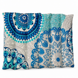 Cojín azul y turquesa